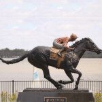 bronze horse and jockey sculpture