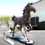 bronze running horse sculpture