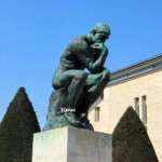 Man Sitting Thinking Statue