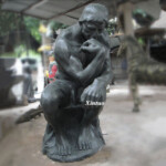 Man Sitting Thinking Statue