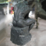 Man Sitting Thinking Statue