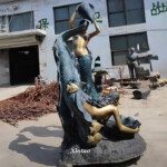 large outdoor mermaid statues