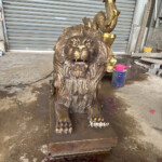 bronze lion statues outdoor