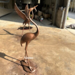 outdoor crane statues