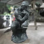Man Sitting Thinking Statue
