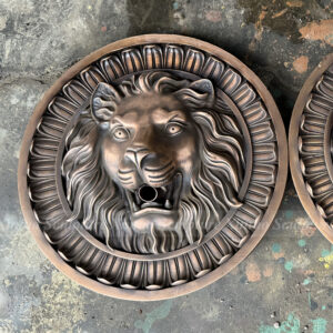 bronze lion head wall fountain