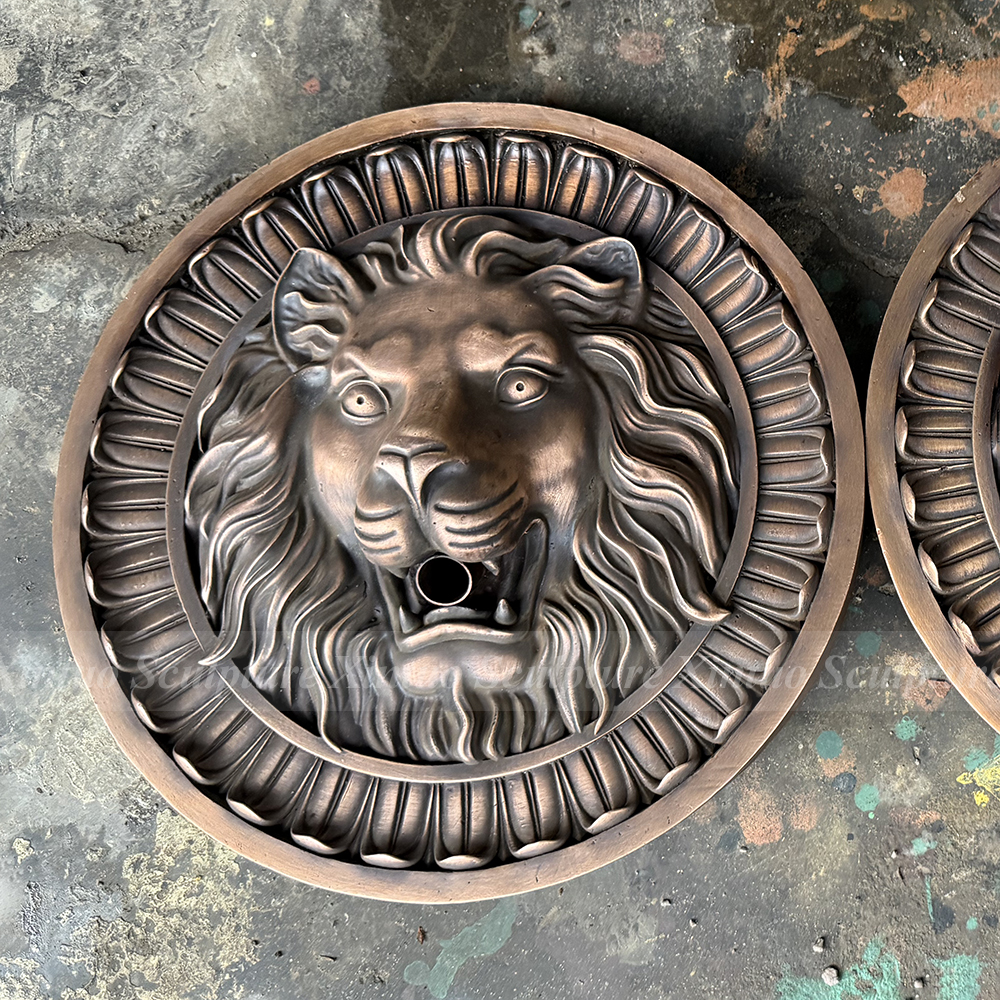 bronze lion head wall fountain
