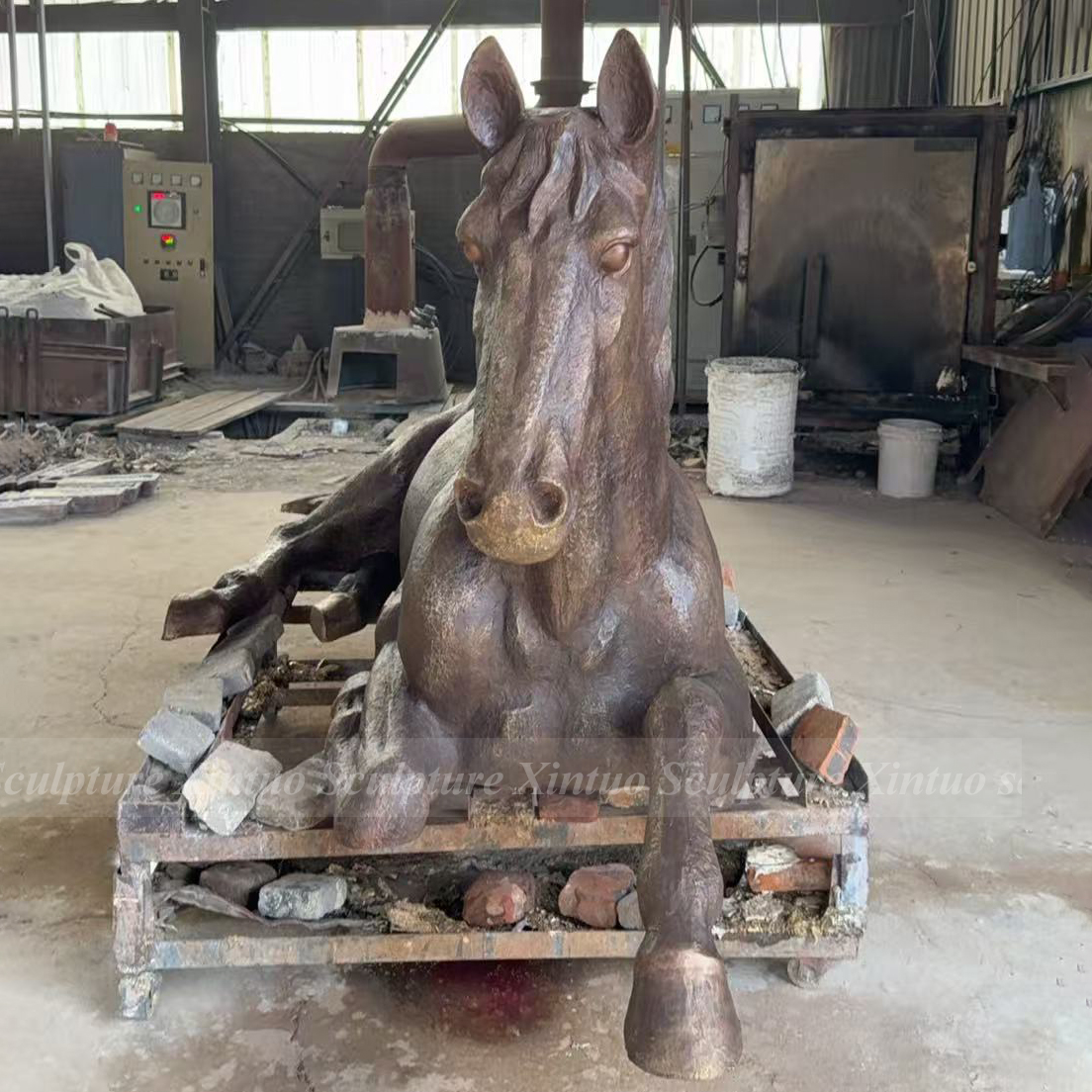 life size bronze horse statue reclining pose