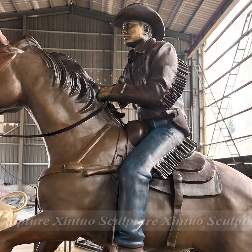 Bronze Cowboy Riding Horse Sculpture