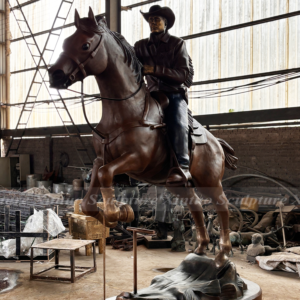 Bronze Cowboy Riding Horse Sculpture