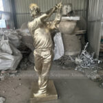 bronze golfer statue