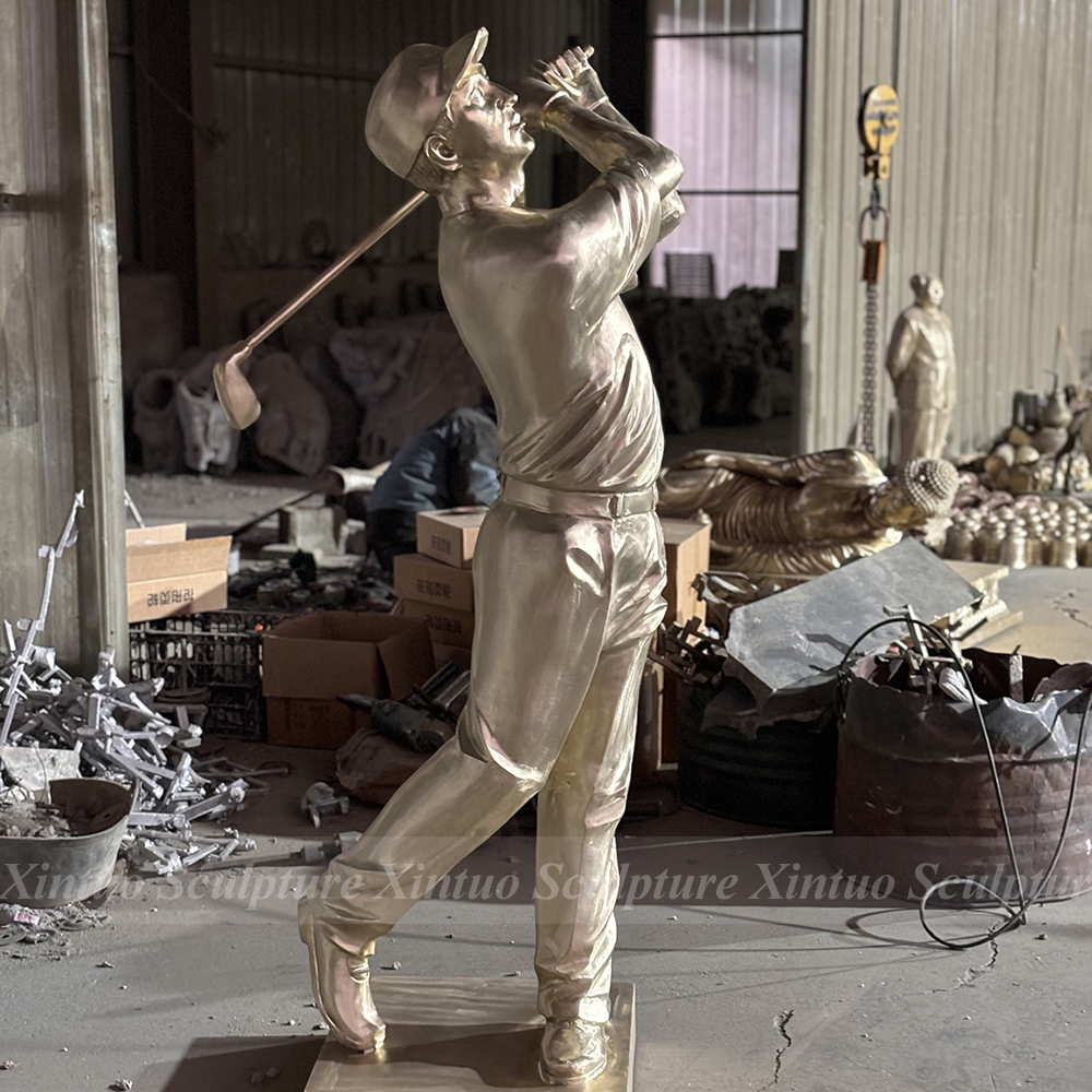 bronze golfer statue