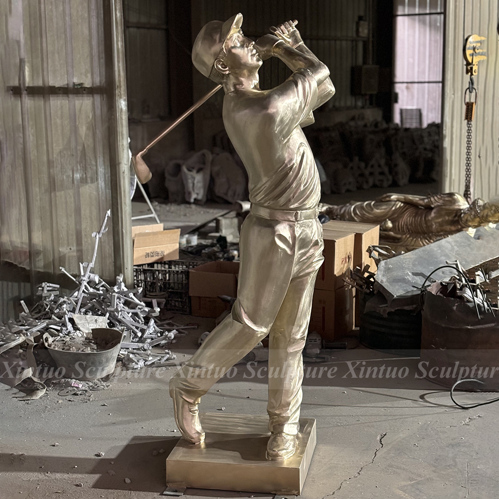 bronze golfer statue