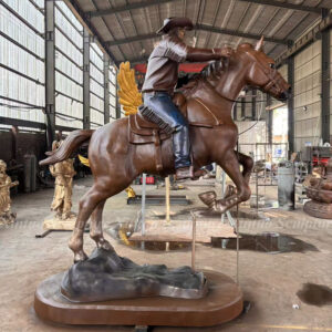 Bronze Cowboy Riding Horse Sculpture