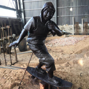 Skateboard Boy Statue