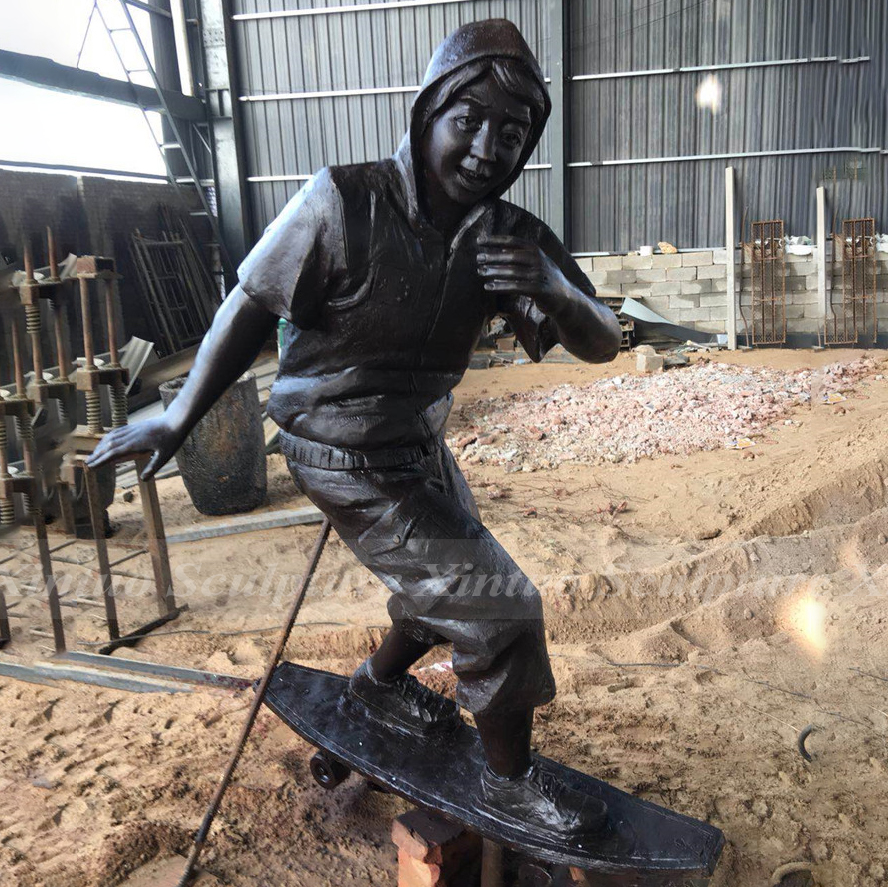 Skateboard Boy Statue