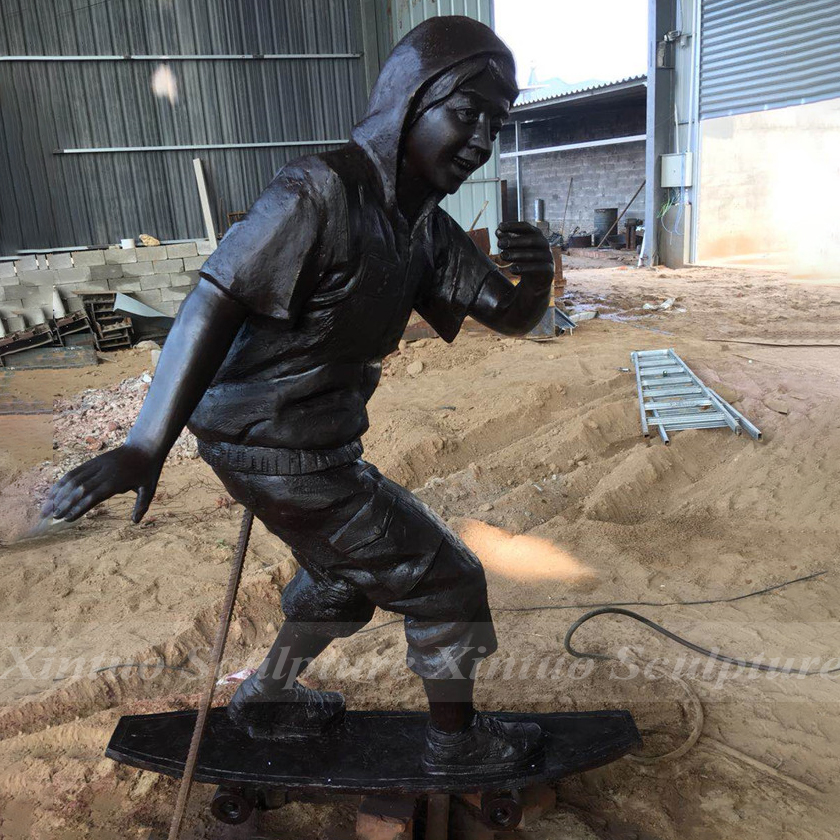 Skateboard Boy Statue