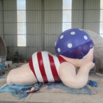 swimming girl sculpture