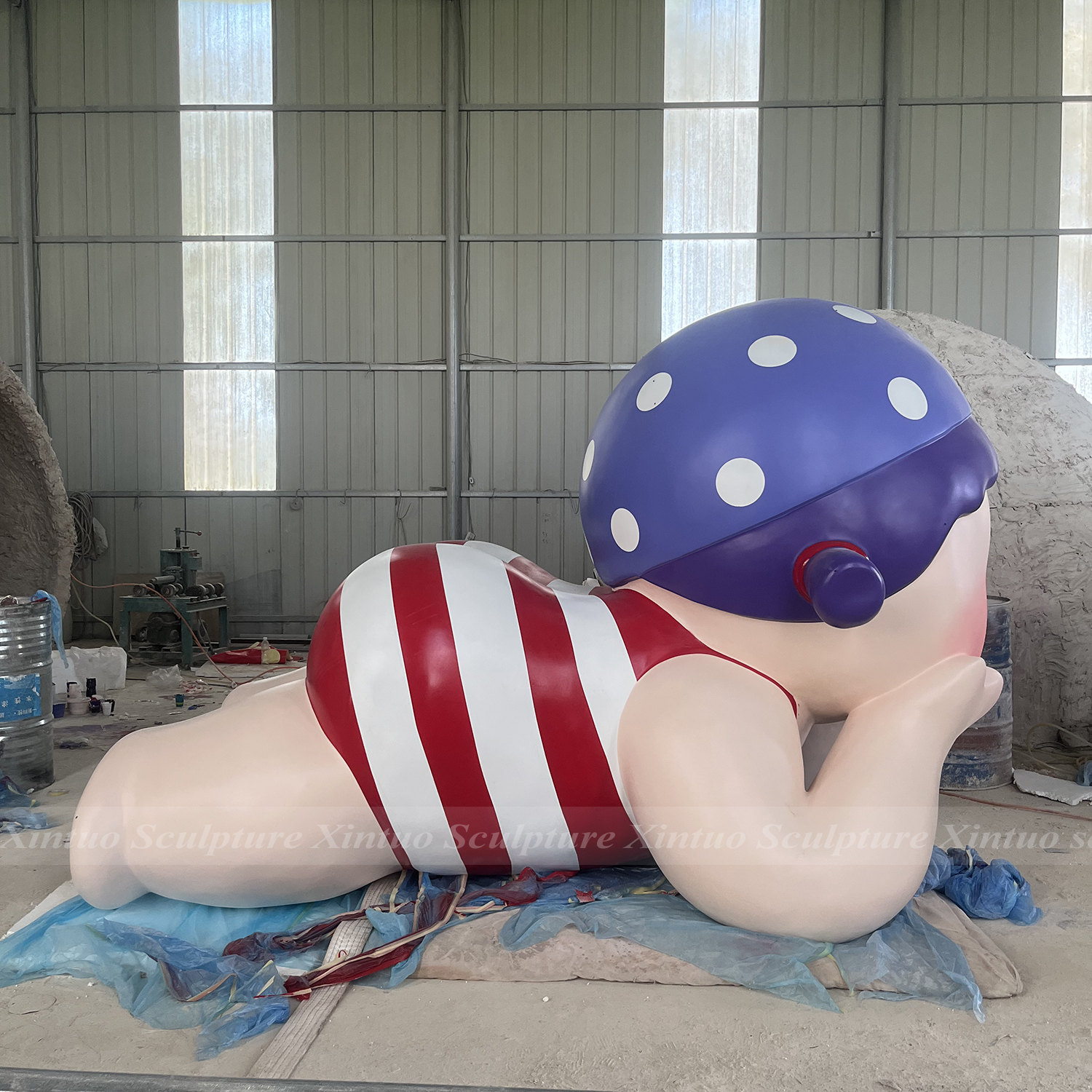 swimming girl sculpture