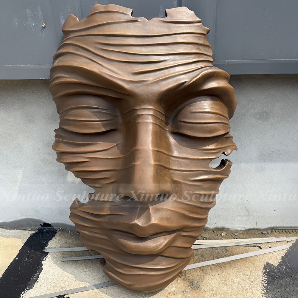 Wall Hanging Face Sculpture