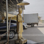 Umbrella Man Statue