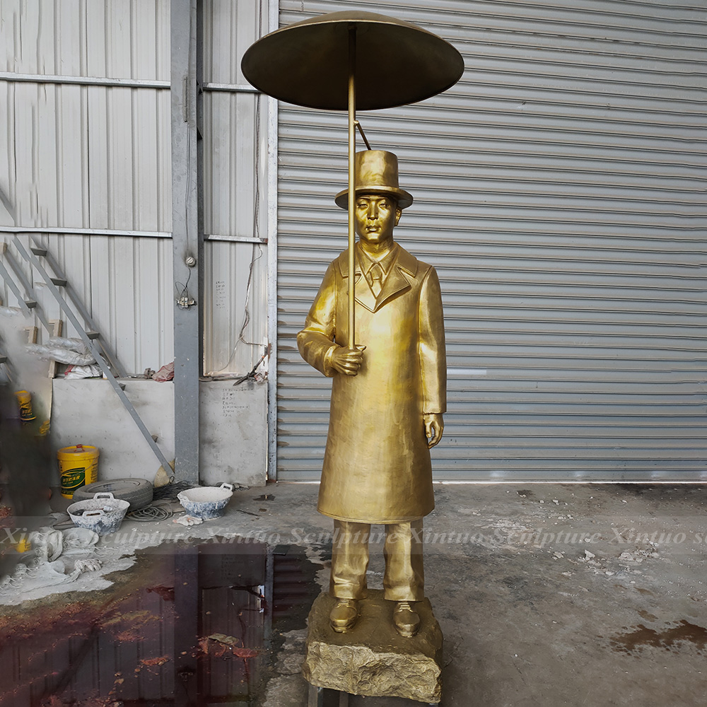 Umbrella Man Statue