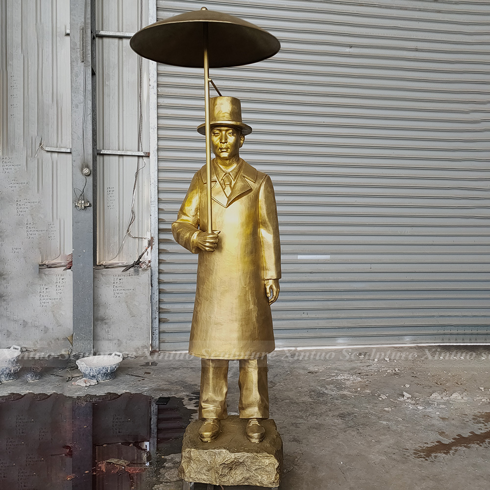 Umbrella Man Statue