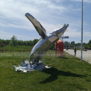 stainless steel whale sculpture