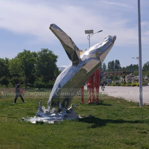 stainless steel whale sculpture